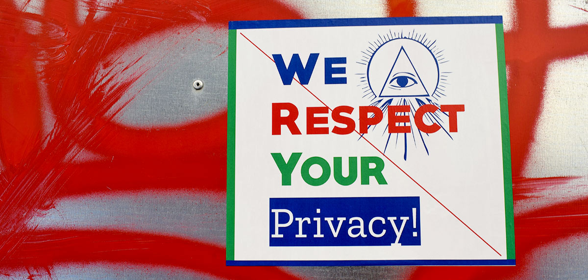 a square sign that reads we respect your privacy